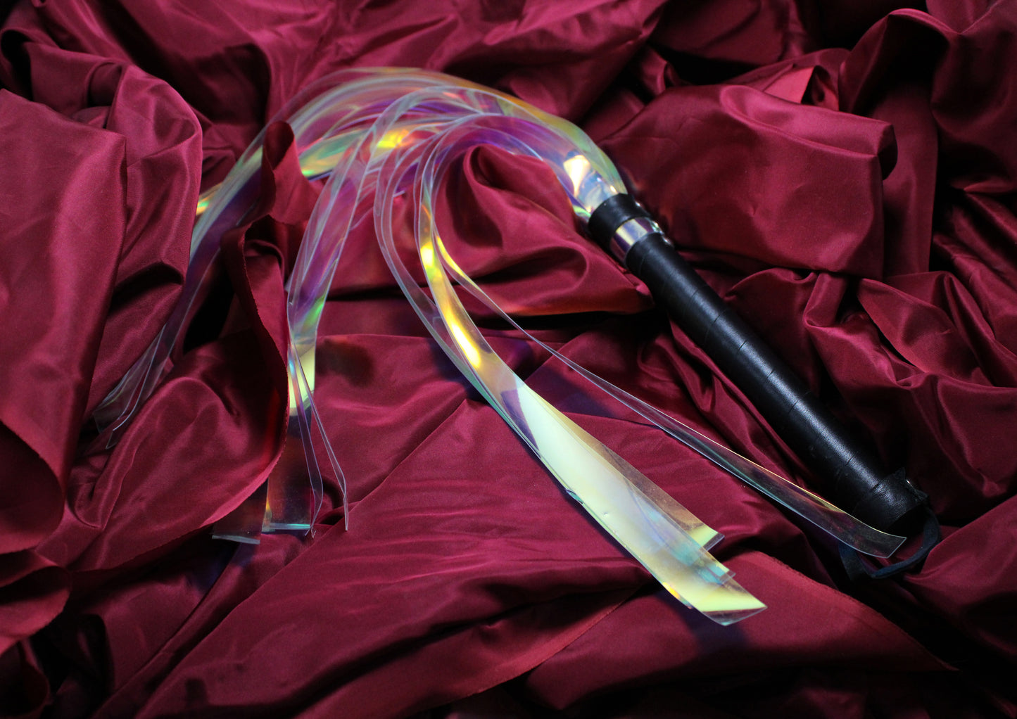 Rainbow flogger in shiny and transparent pvc
