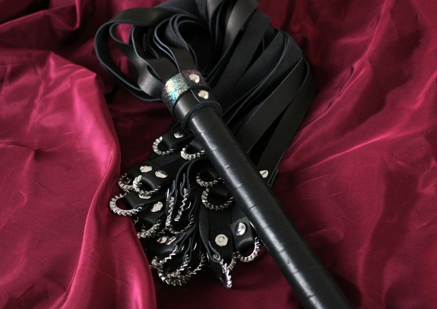 Vampire flogger, steel rings and leather