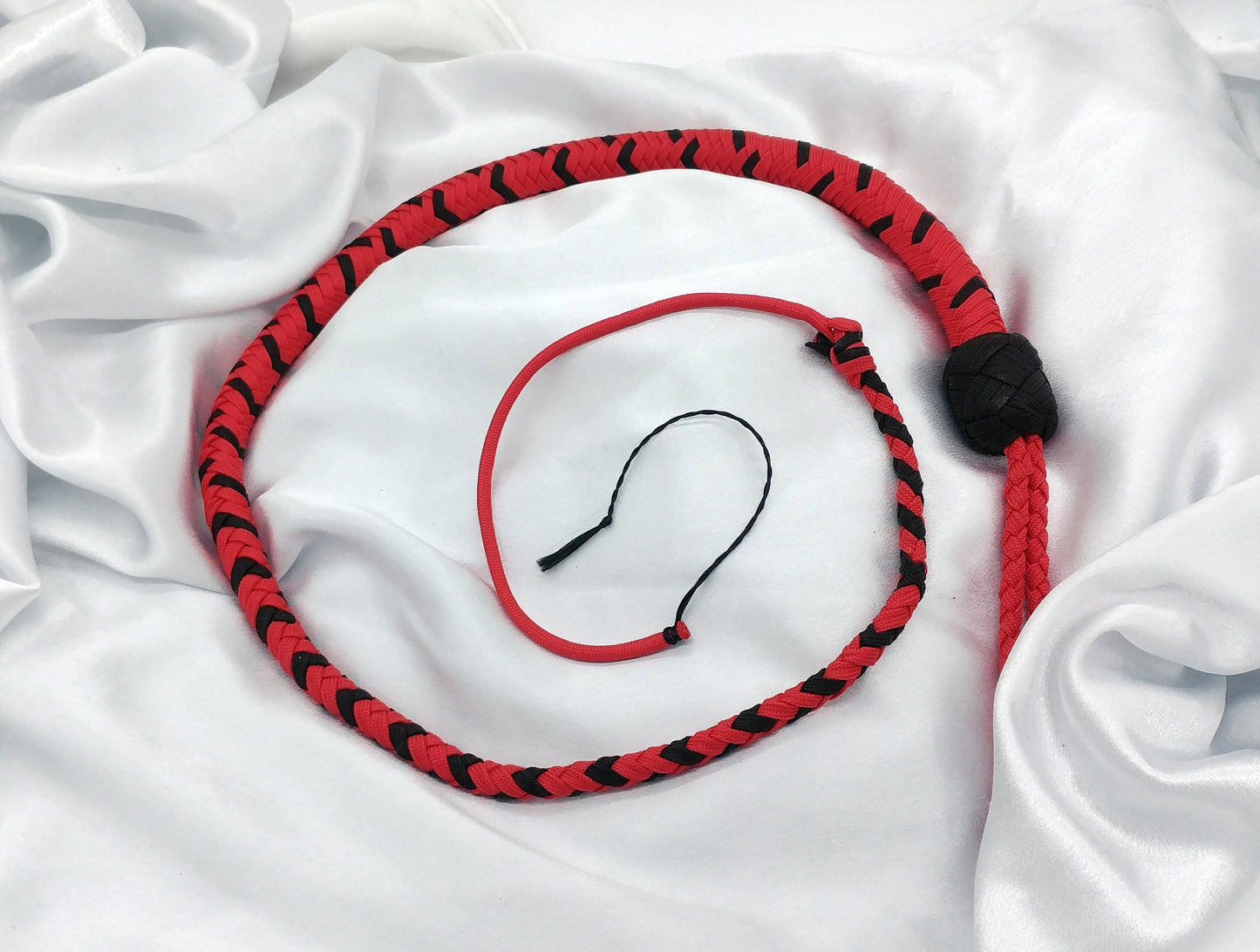 Red and black paracord whip