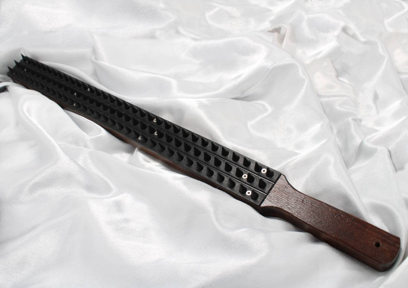 Long paddle with spikes